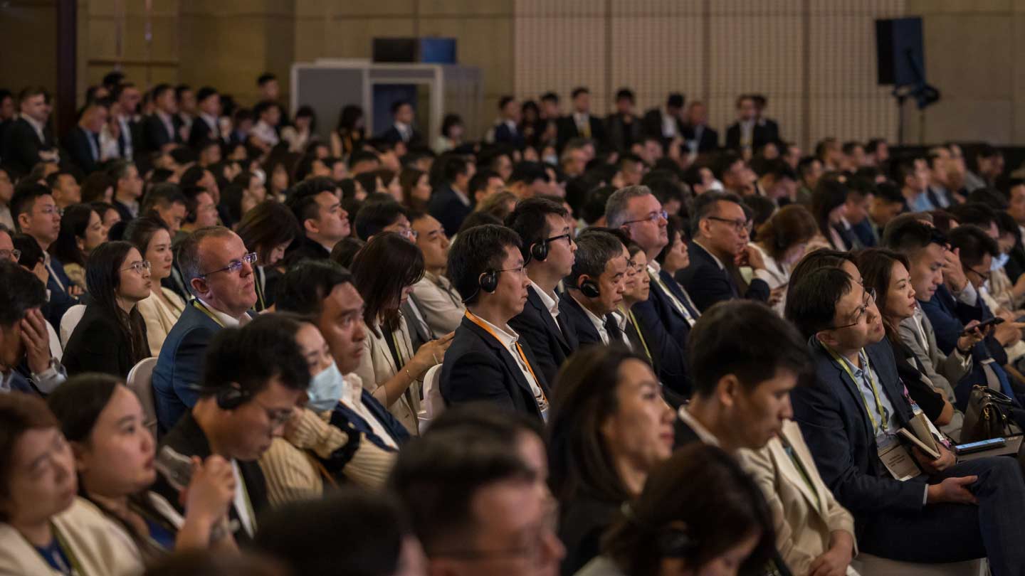 Conference attendees listening