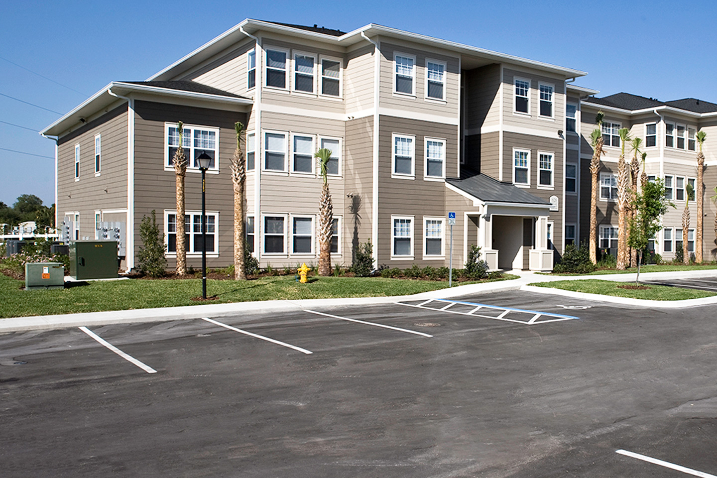 Apartment building and parking lot