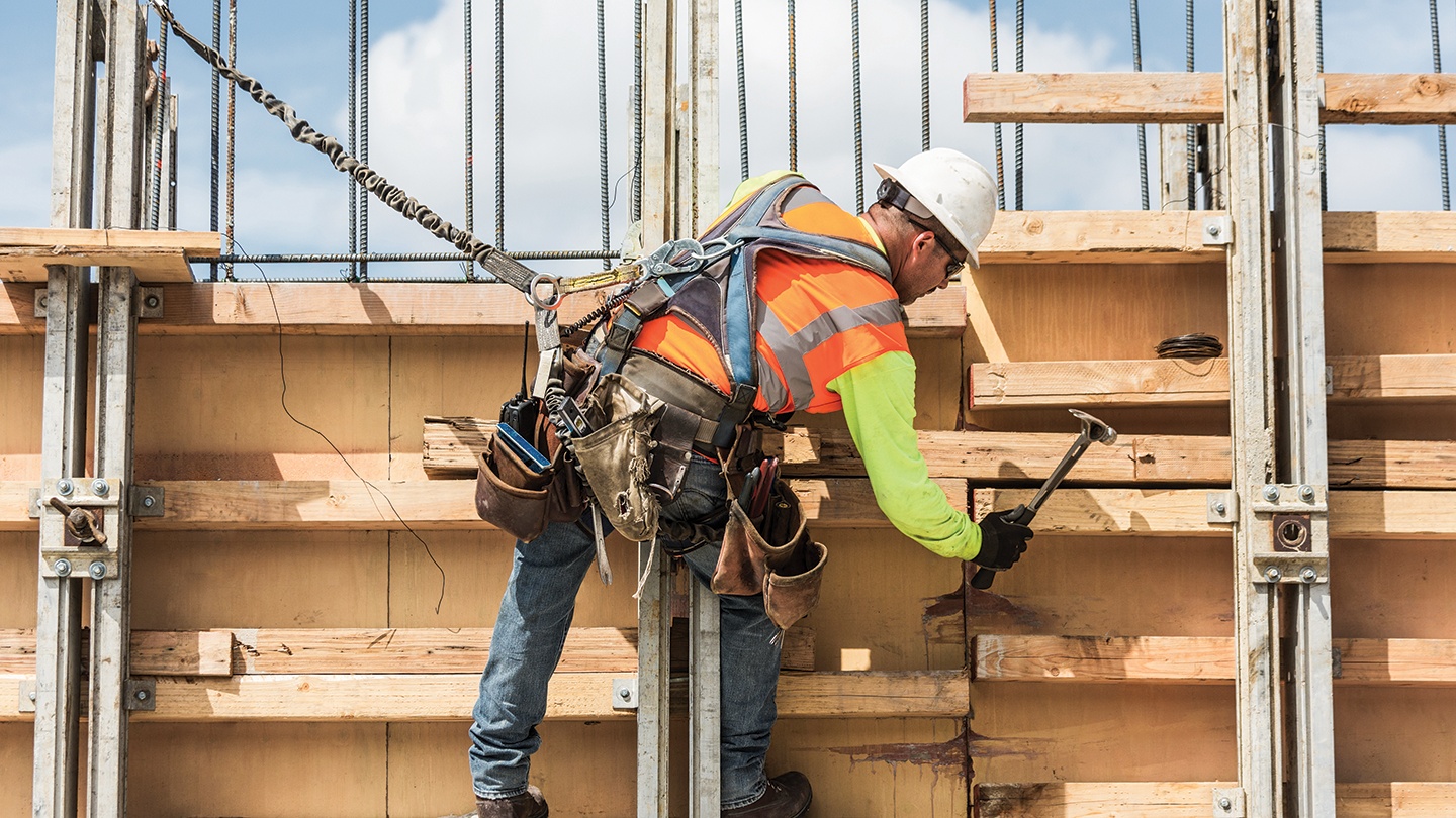 Construction worker using a hammer