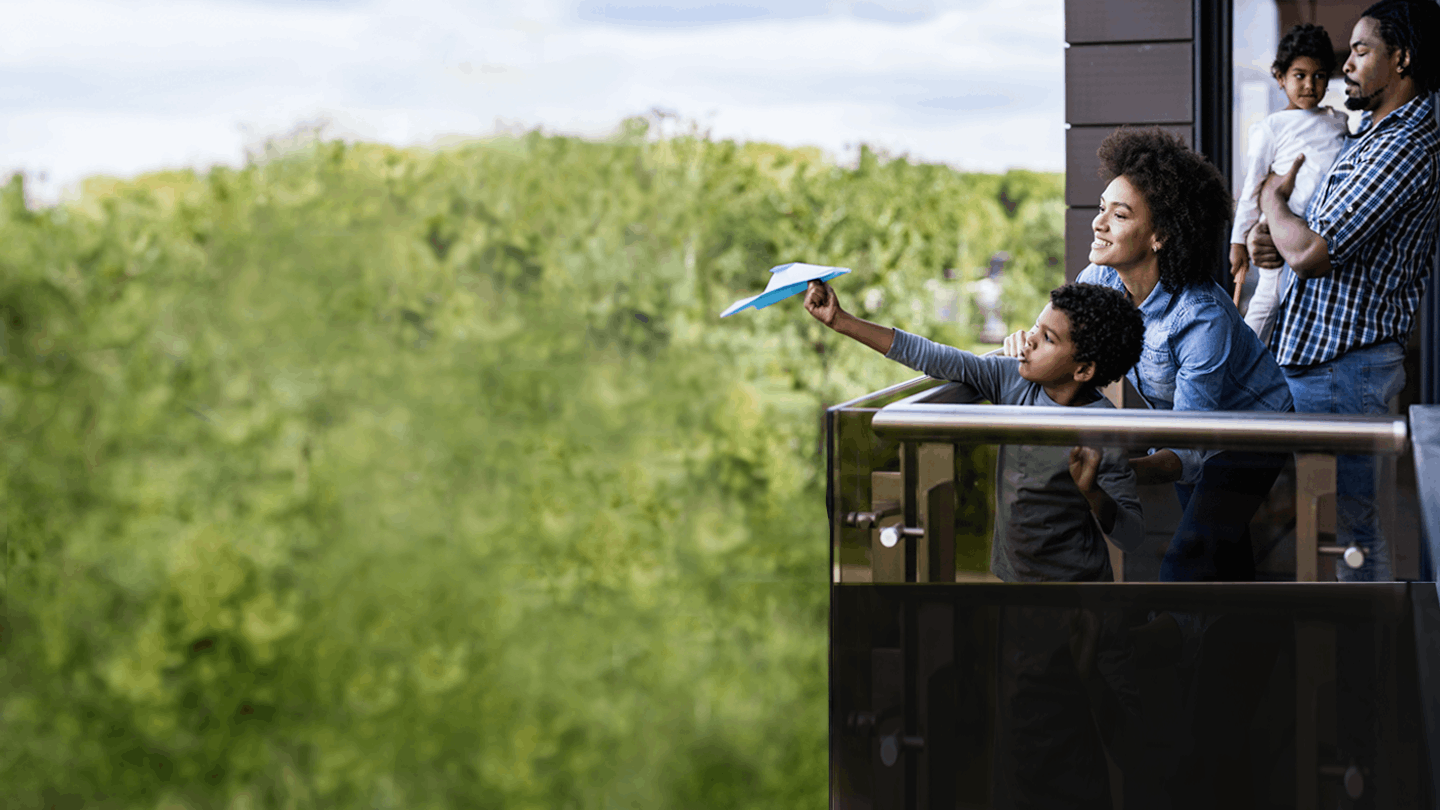 family on their balcony