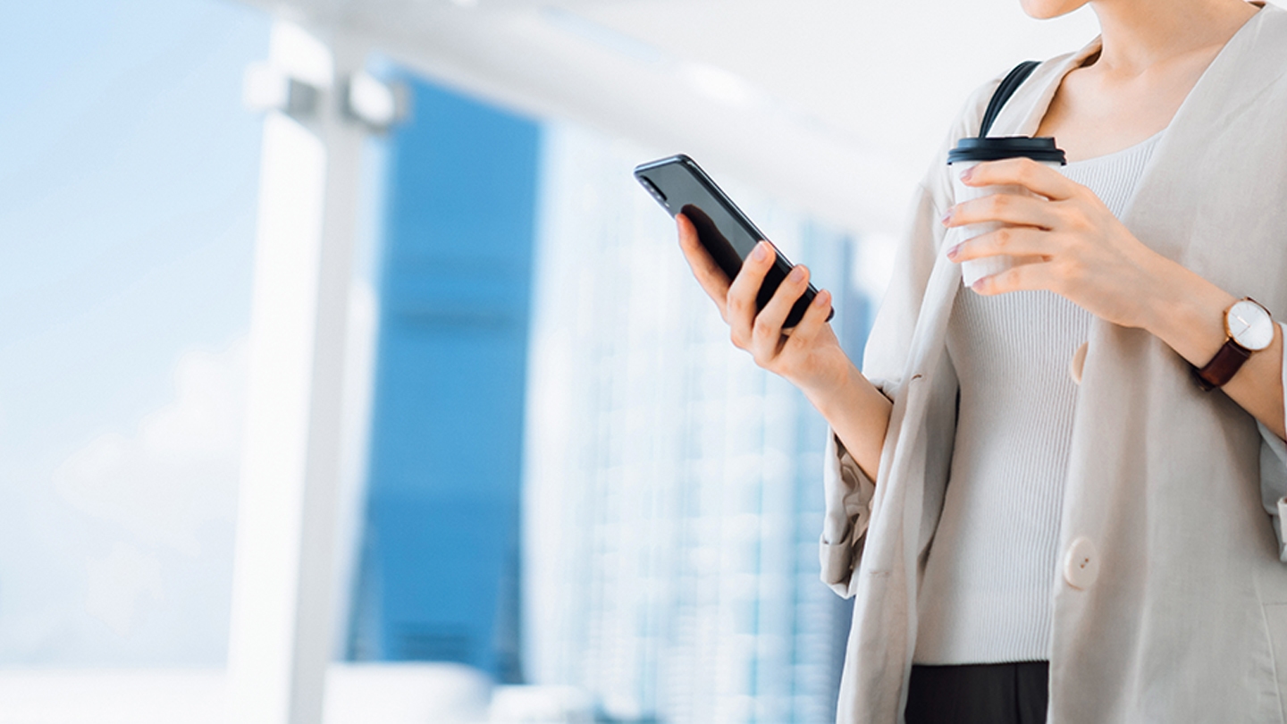 woman looking at cell phone.