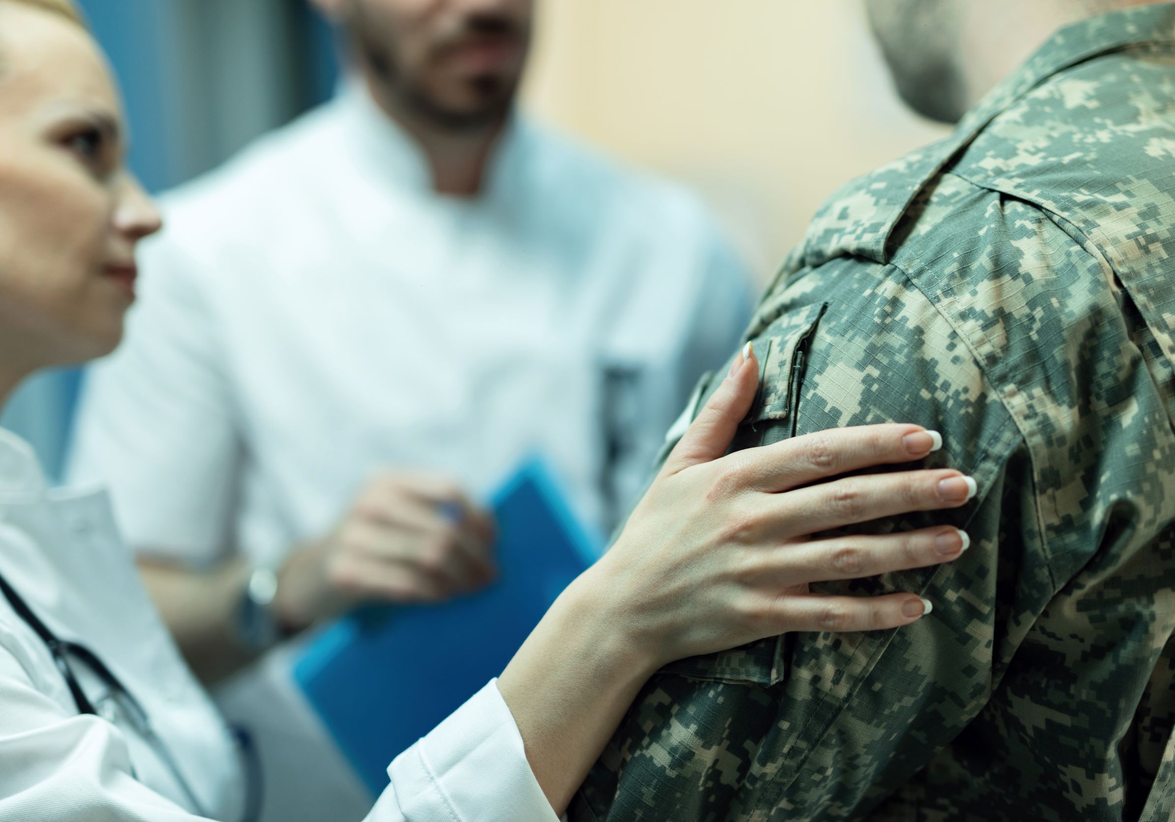 Healthcare worker talking to veteran