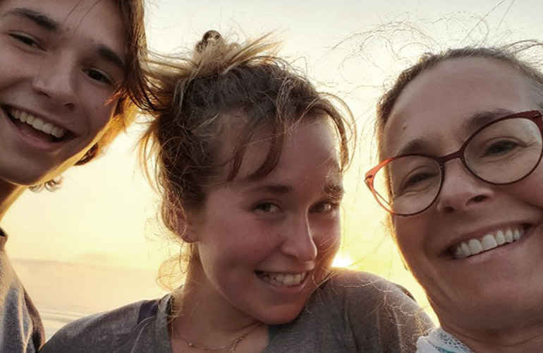 Boyd poses for a photo with her children at sunset. Boyd cites her biggest accomplishment as “raising two children who are far more talented, insightful and charismatic than I am.”  