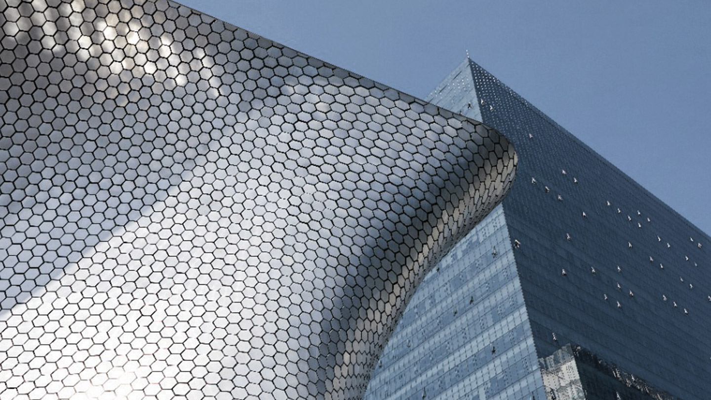 Mirrored building and sculpture