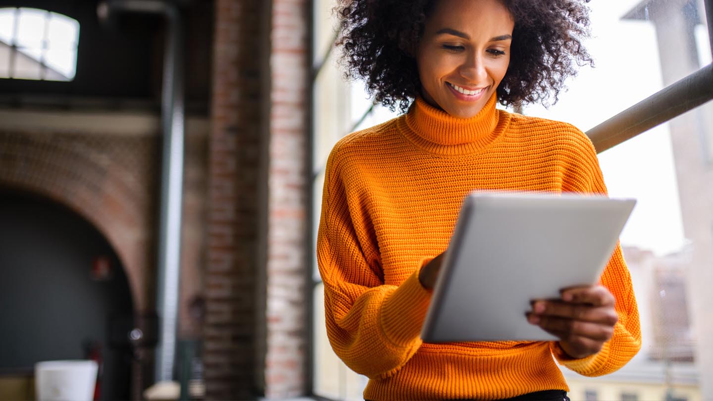 Woman holding a tablet