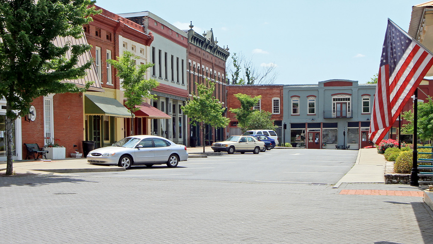 city view of buildings and cars