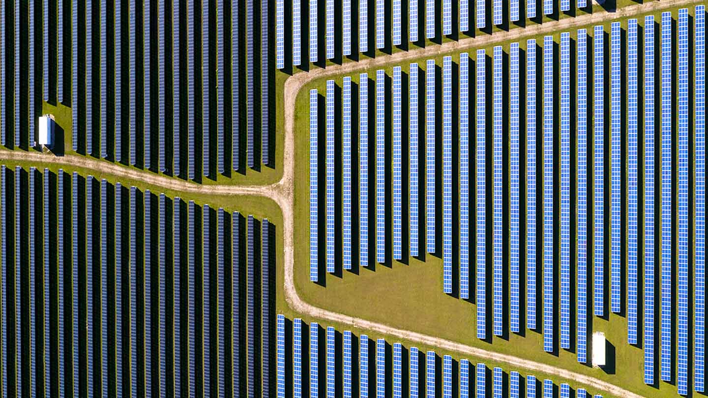 Renewable energy plants, aerial view of solar panels.