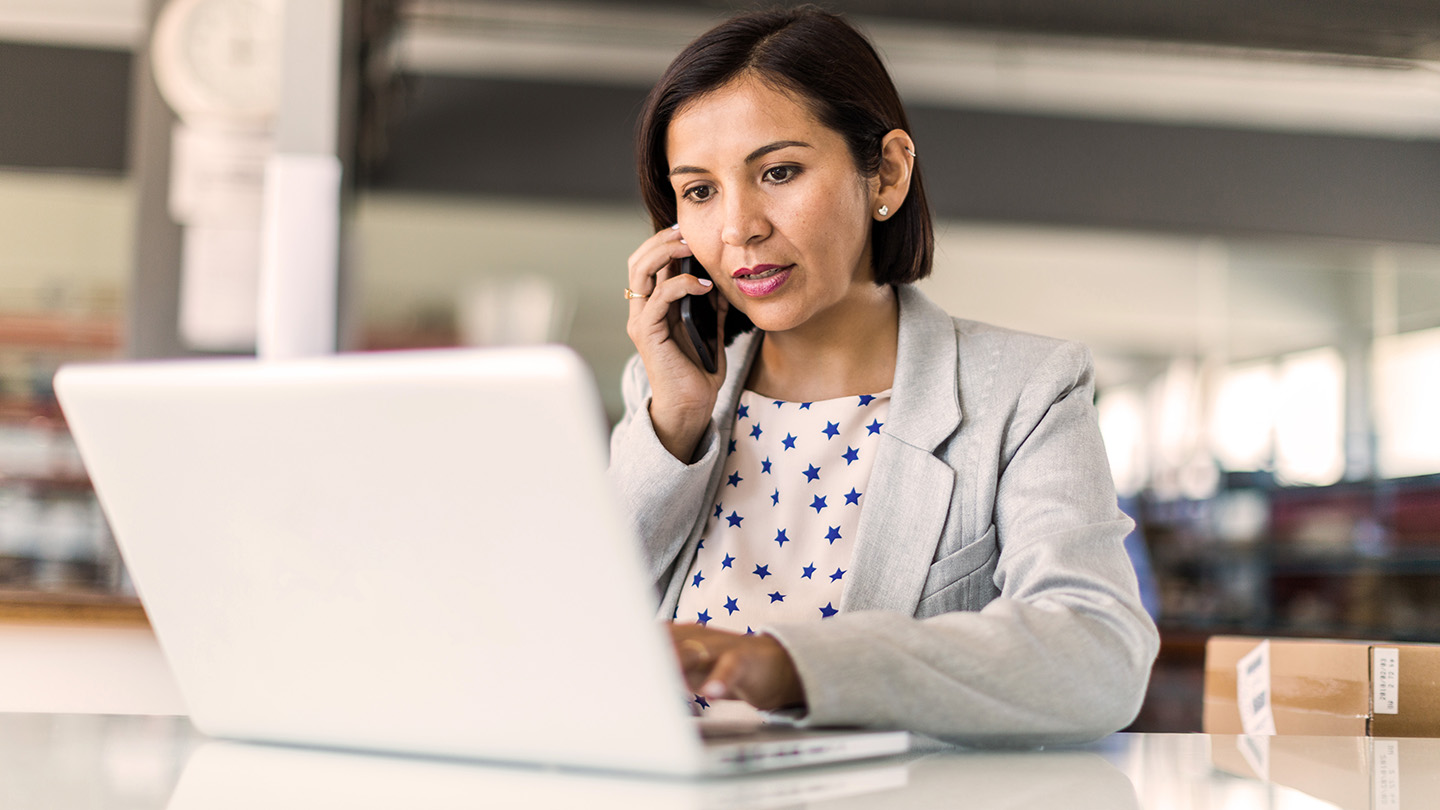 woman using her laptop