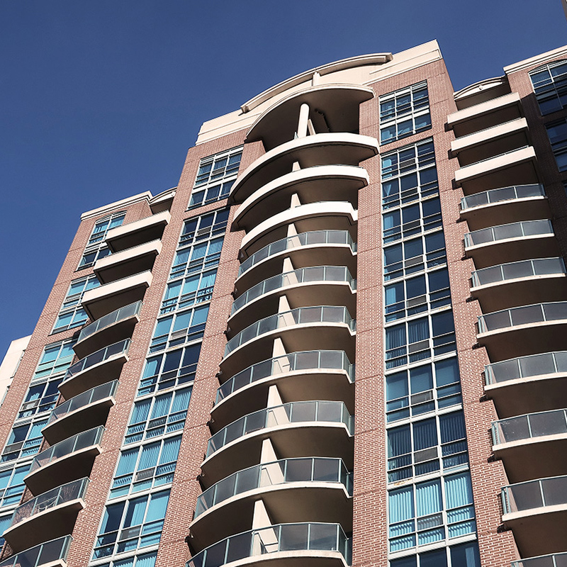 Multifamily building view looking up