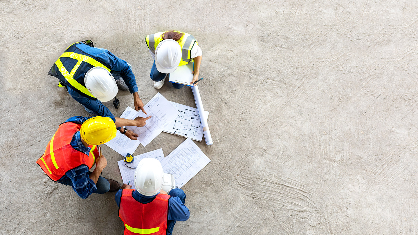 Construction workers having a meeting