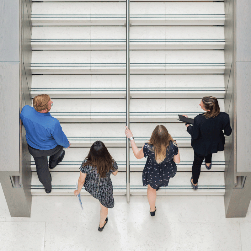 People walking up the stairs