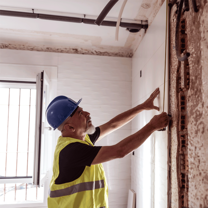 contractor working on wall