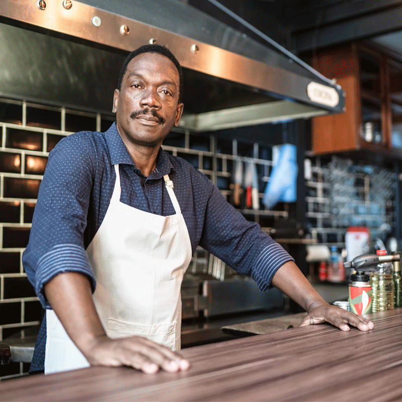 Man behind bar