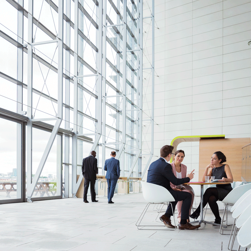 People talking in a table in an office setting
