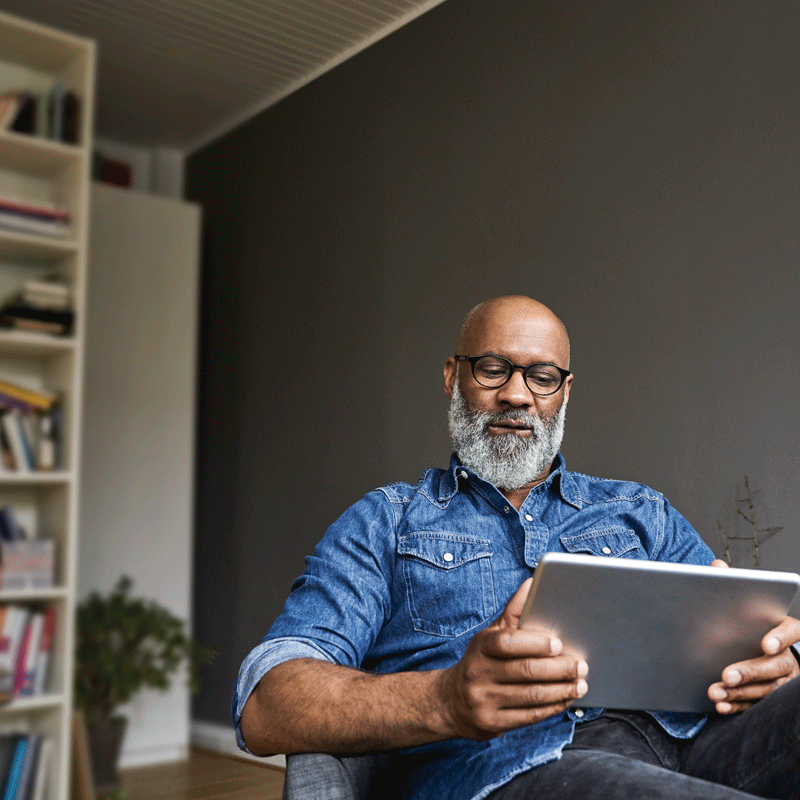 Man looking at tablet