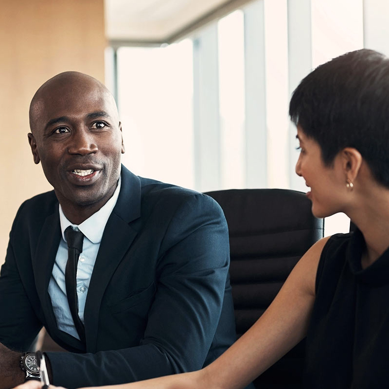 Black businessman and asian business woman
