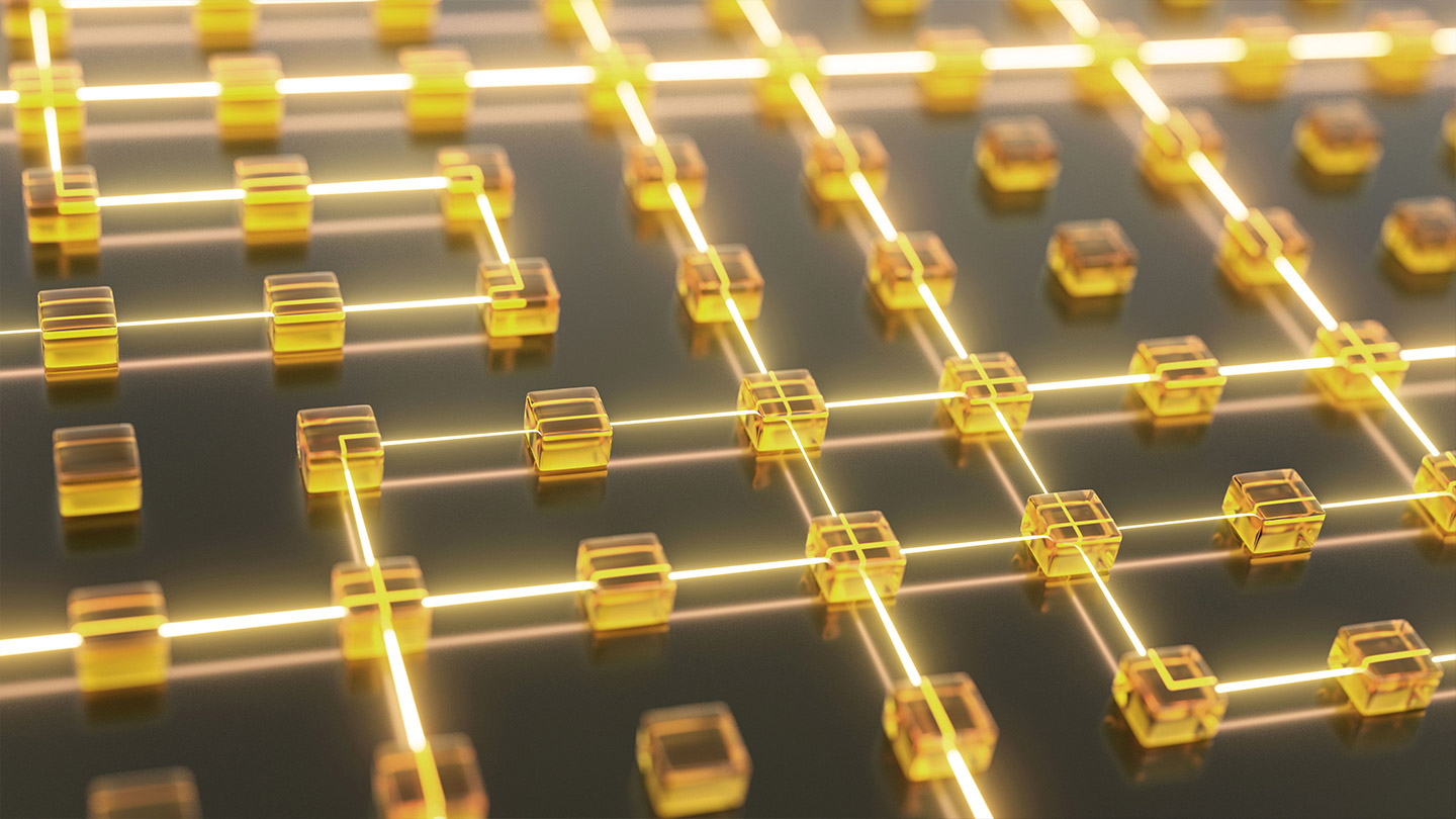 Aerial view of light maze on dark background