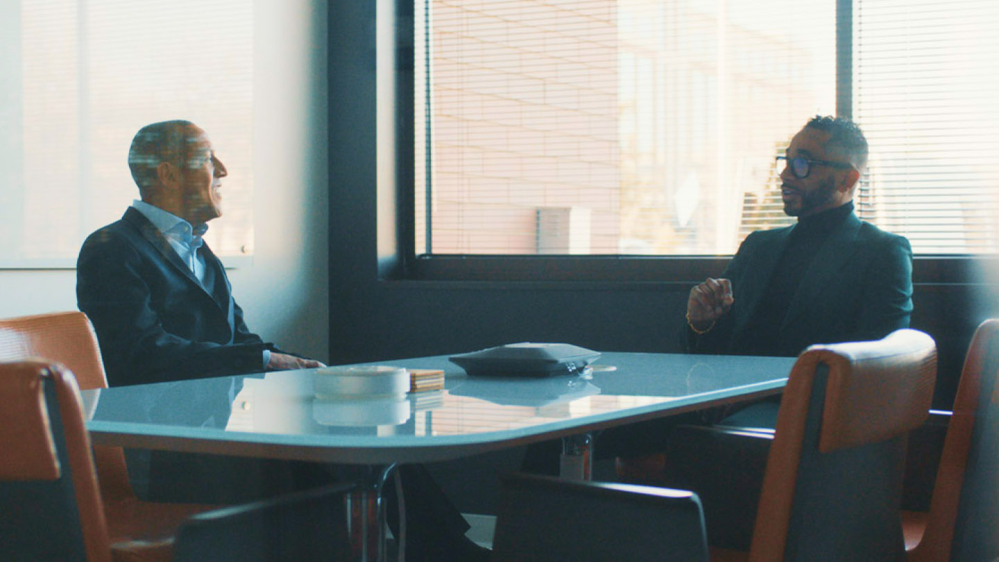 Two men talking