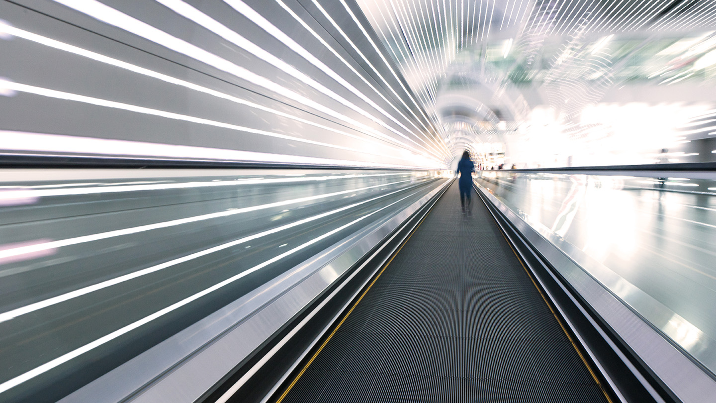 Person walking through a tunnel