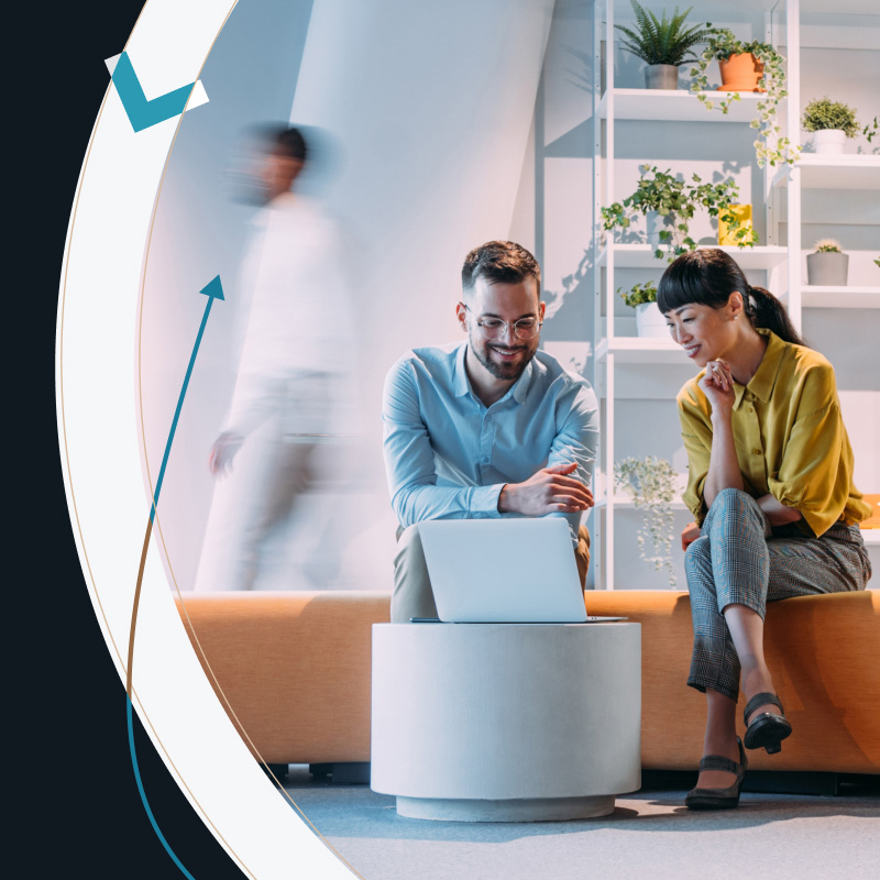 2 people using a laptop