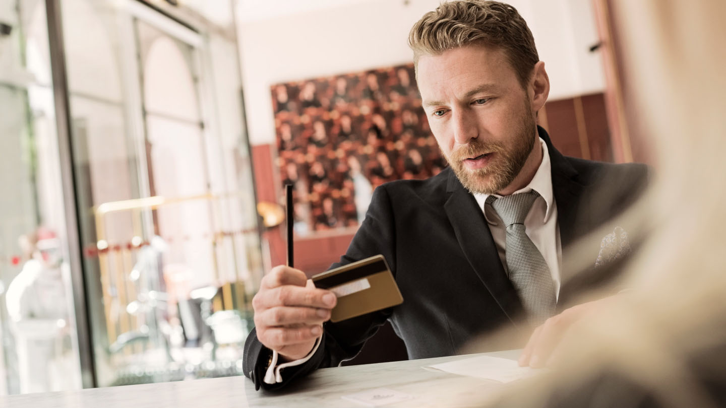 man using a credit card