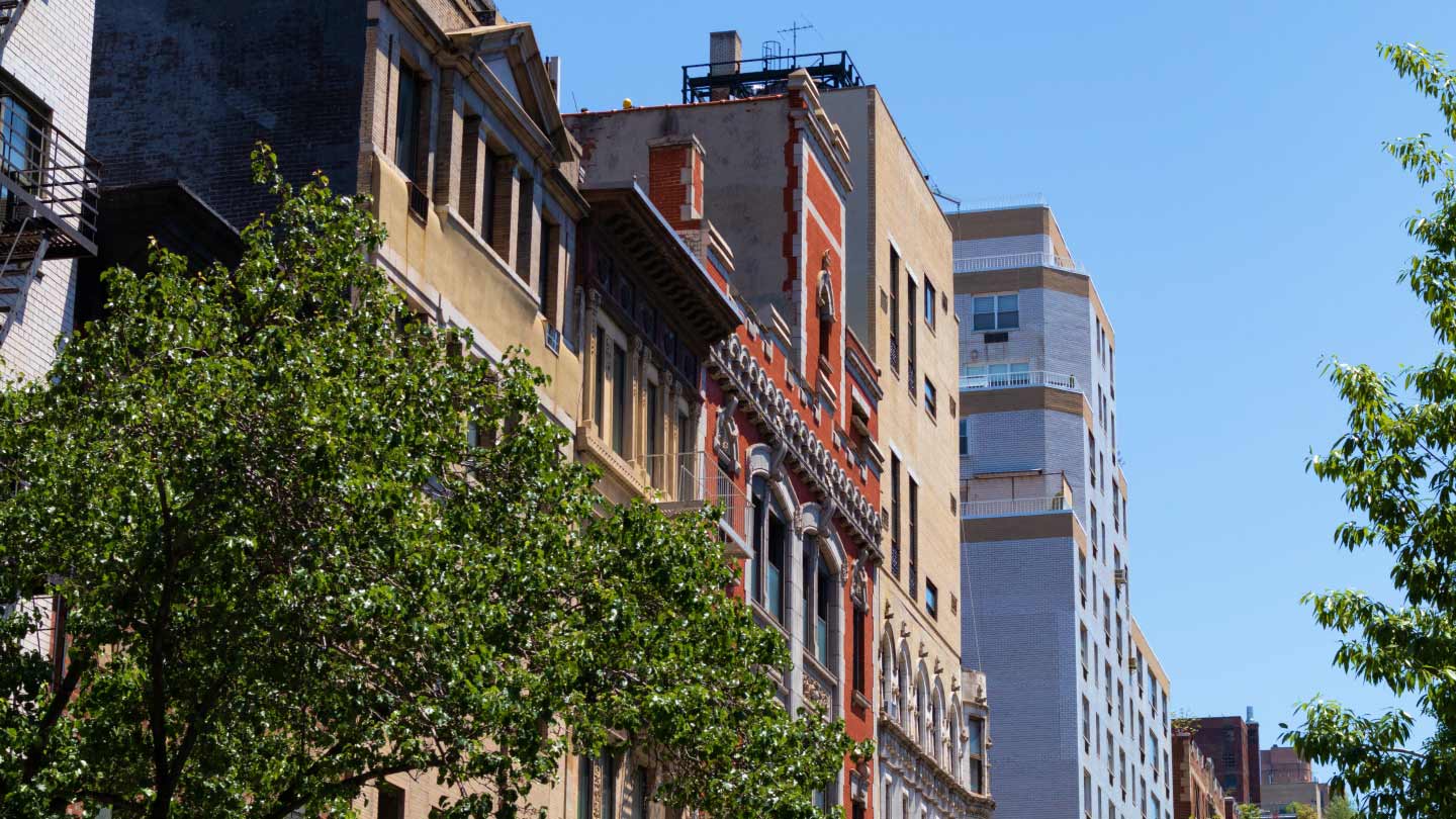 Multifamily buildings and trees
