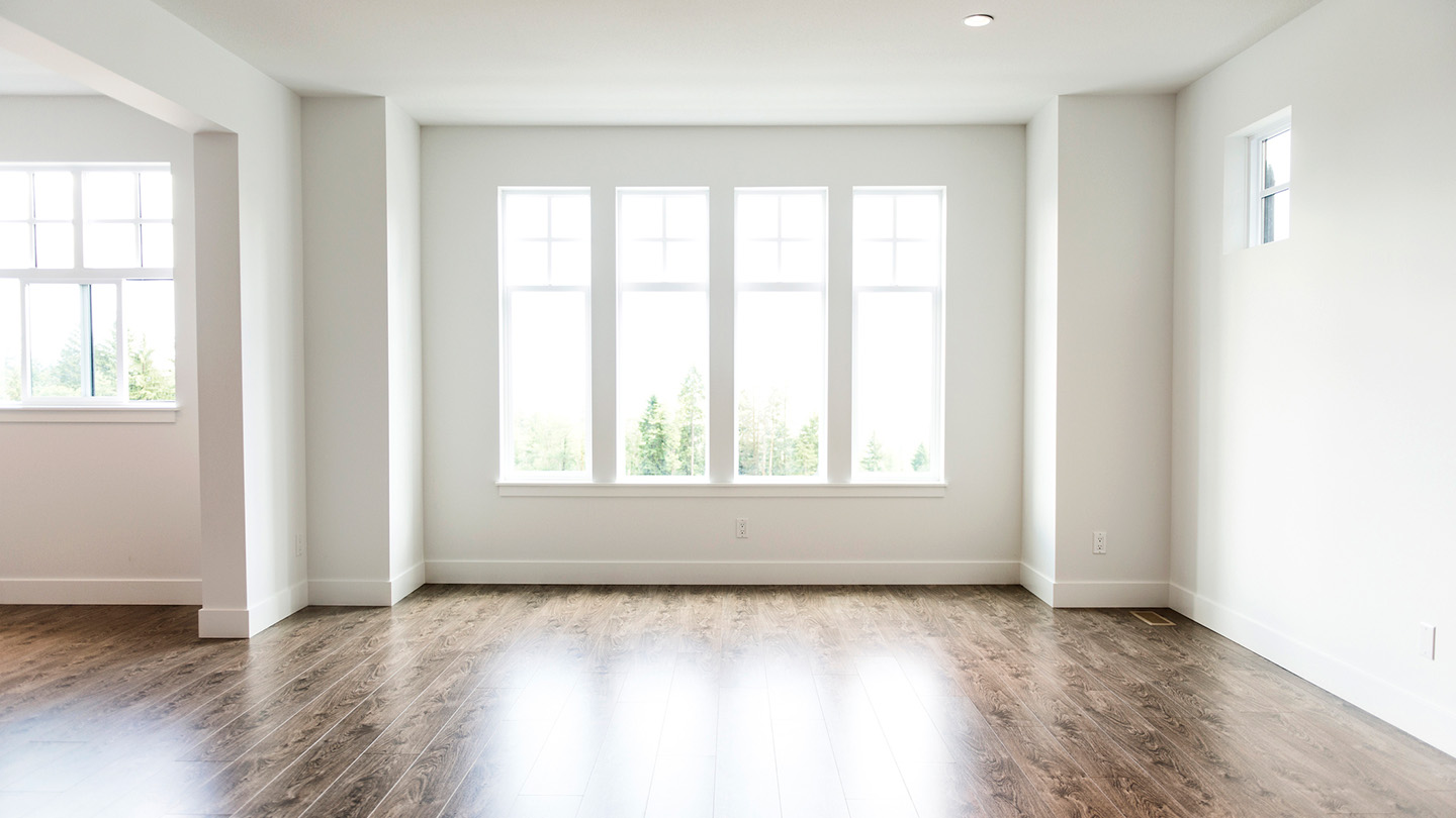 Freshly painted interior of an apartment unit with large windows