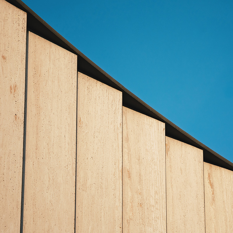 wooden fence with a blue sky