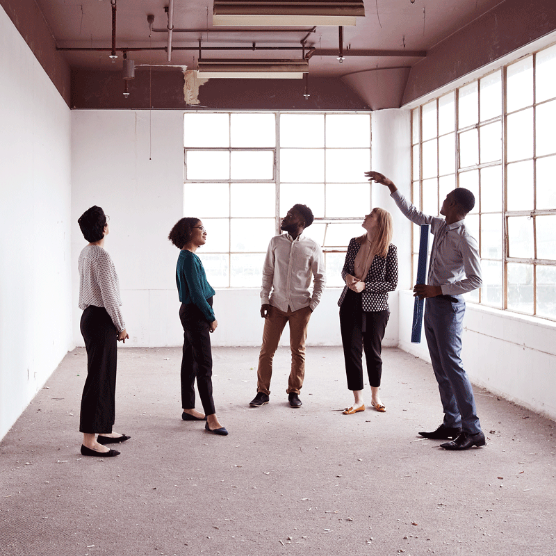 People gathered in an empty room