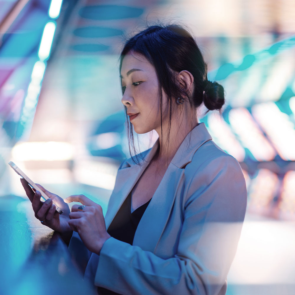 Professional looking at mobile device