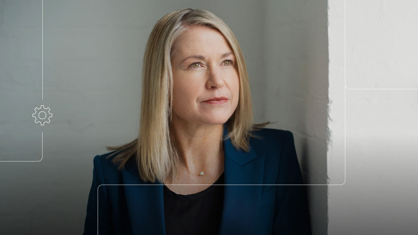 Close-up portrait of a woman in a blue blazer looking off to the side, with subtle interface-style line graphics overlaid.