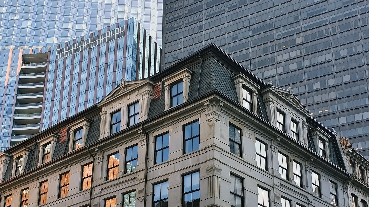 Overlapping old and new office buildings in Downtown Boston