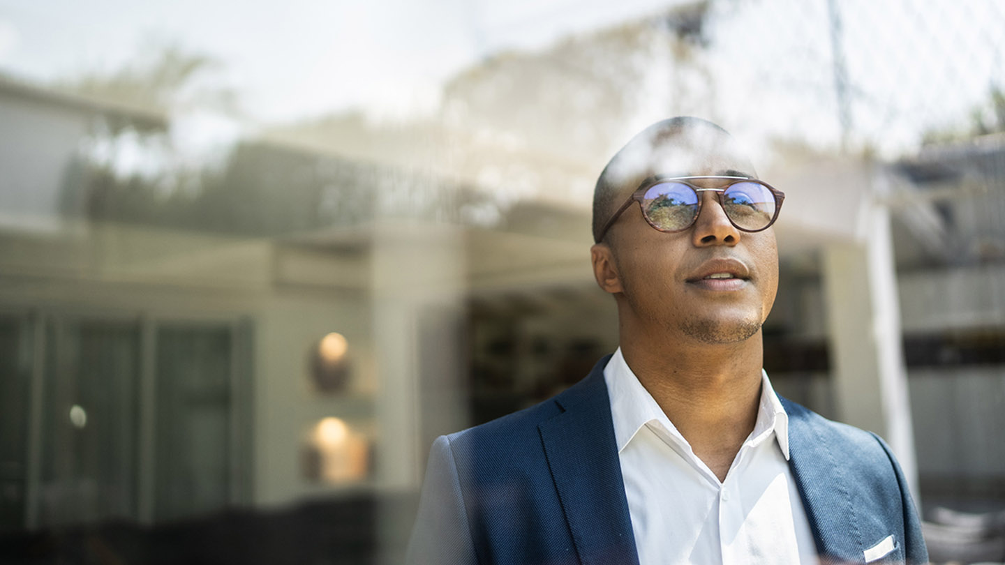 Businessman looking out of window